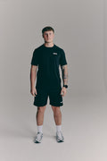 SACA Essential Shorts in black — front view worn by model