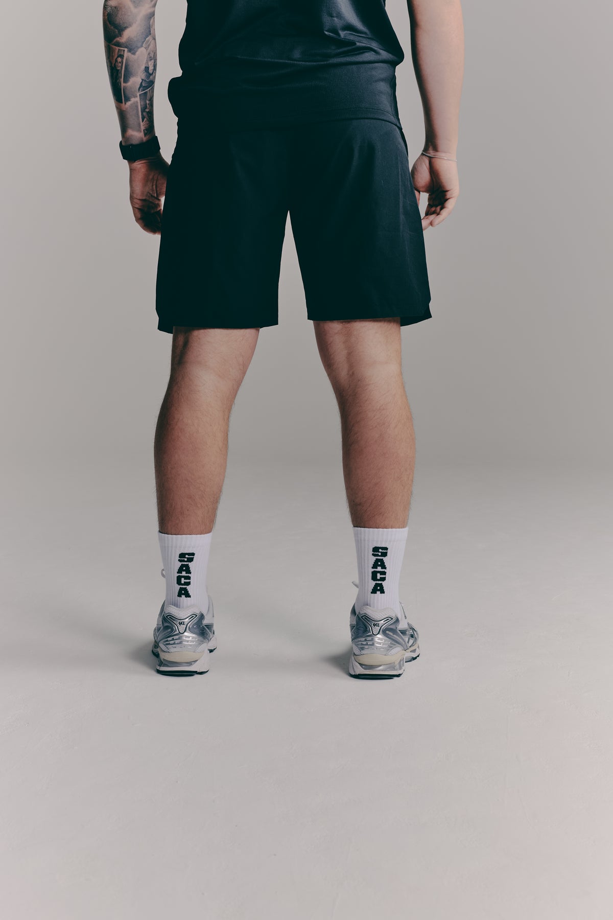 SACA Socks 3-Pack in black, white and orange — front view
