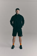 SACA Flux Windbreaker in black — front view worn by model