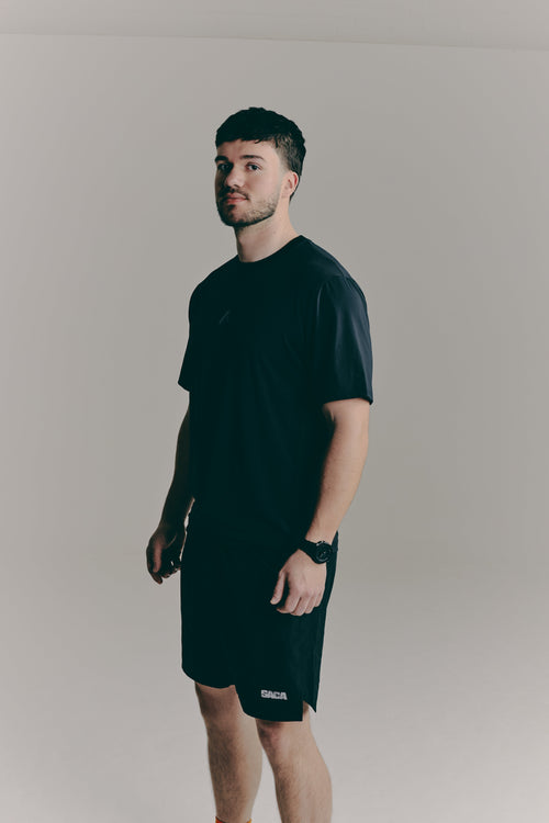 SACA Contest T-Shirt in black — side view worn by model