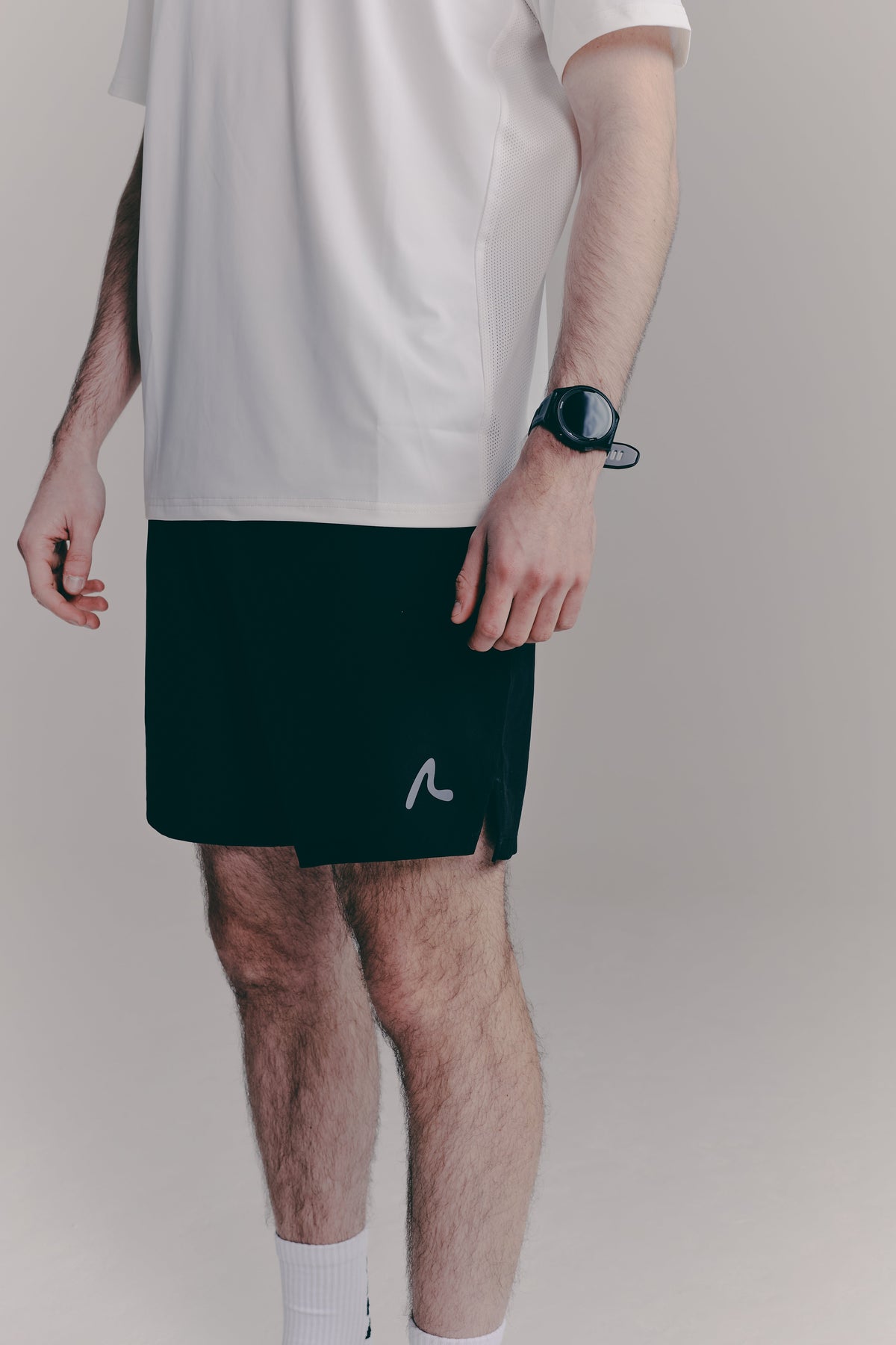 SACA Contest Shorts in black — front view worn by model