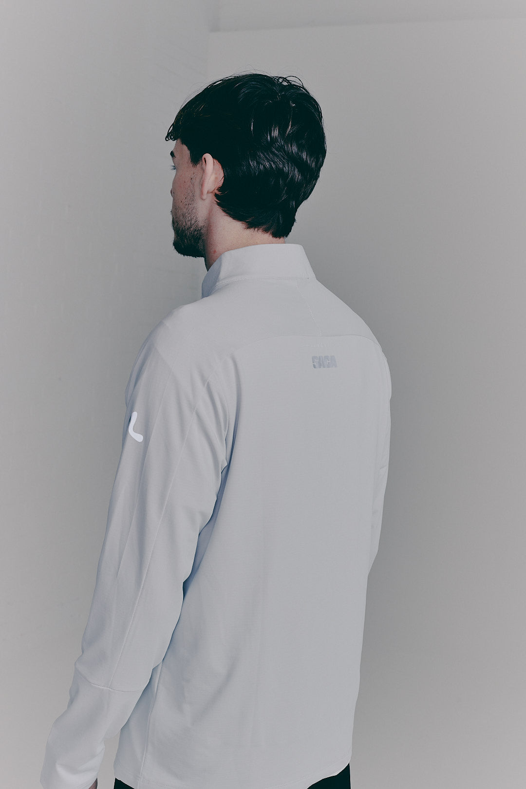 SACA Velo Quarter Zip in grey — detail of zip and collar