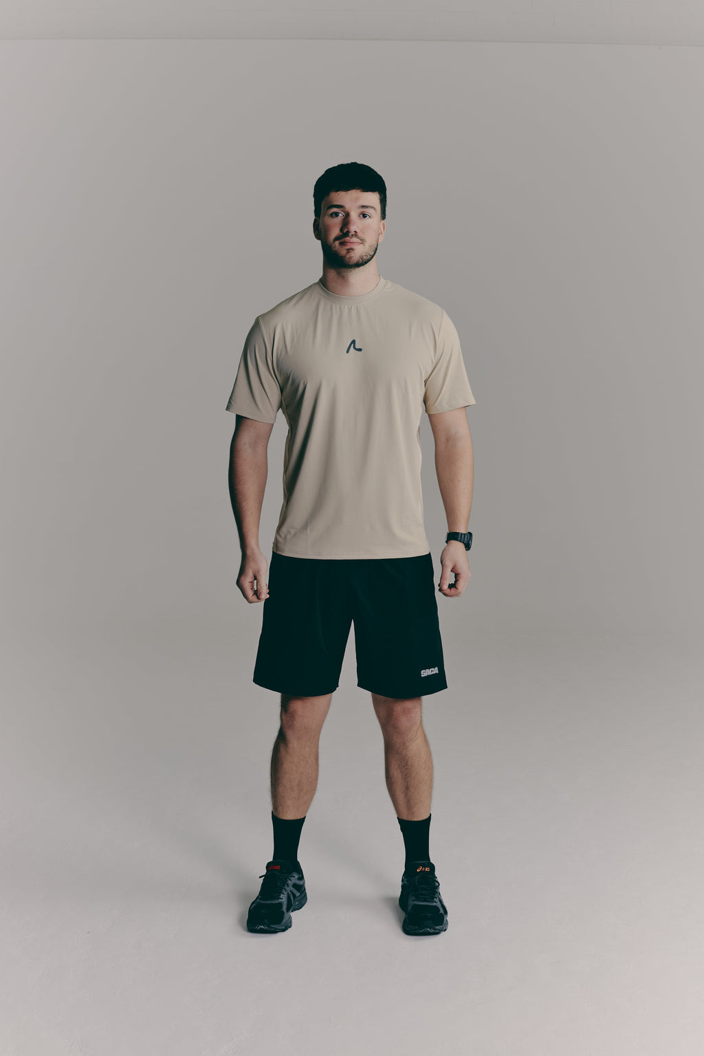 SACA Contest T-Shirt in beige — front view worn by model