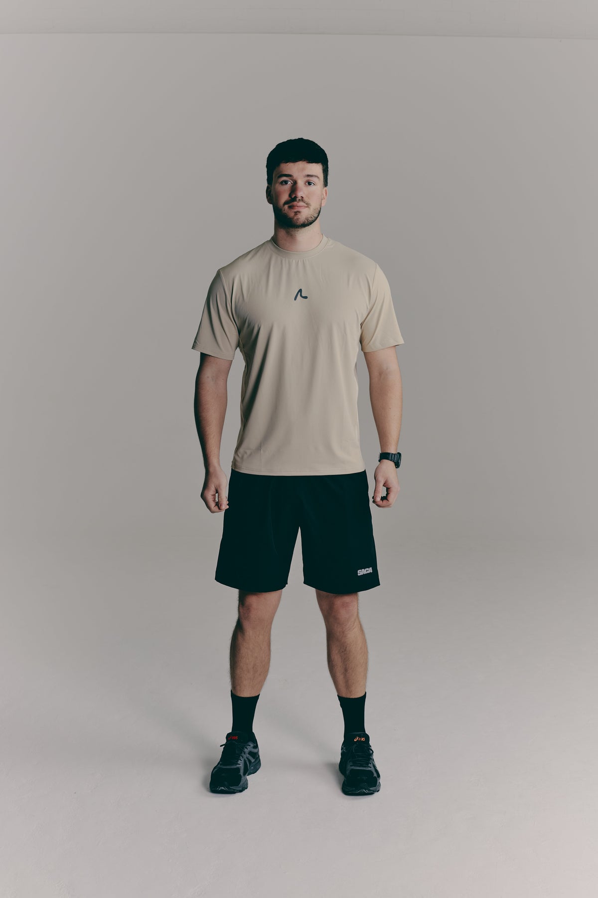 SACA Contest T-Shirt in beige — front view worn by model