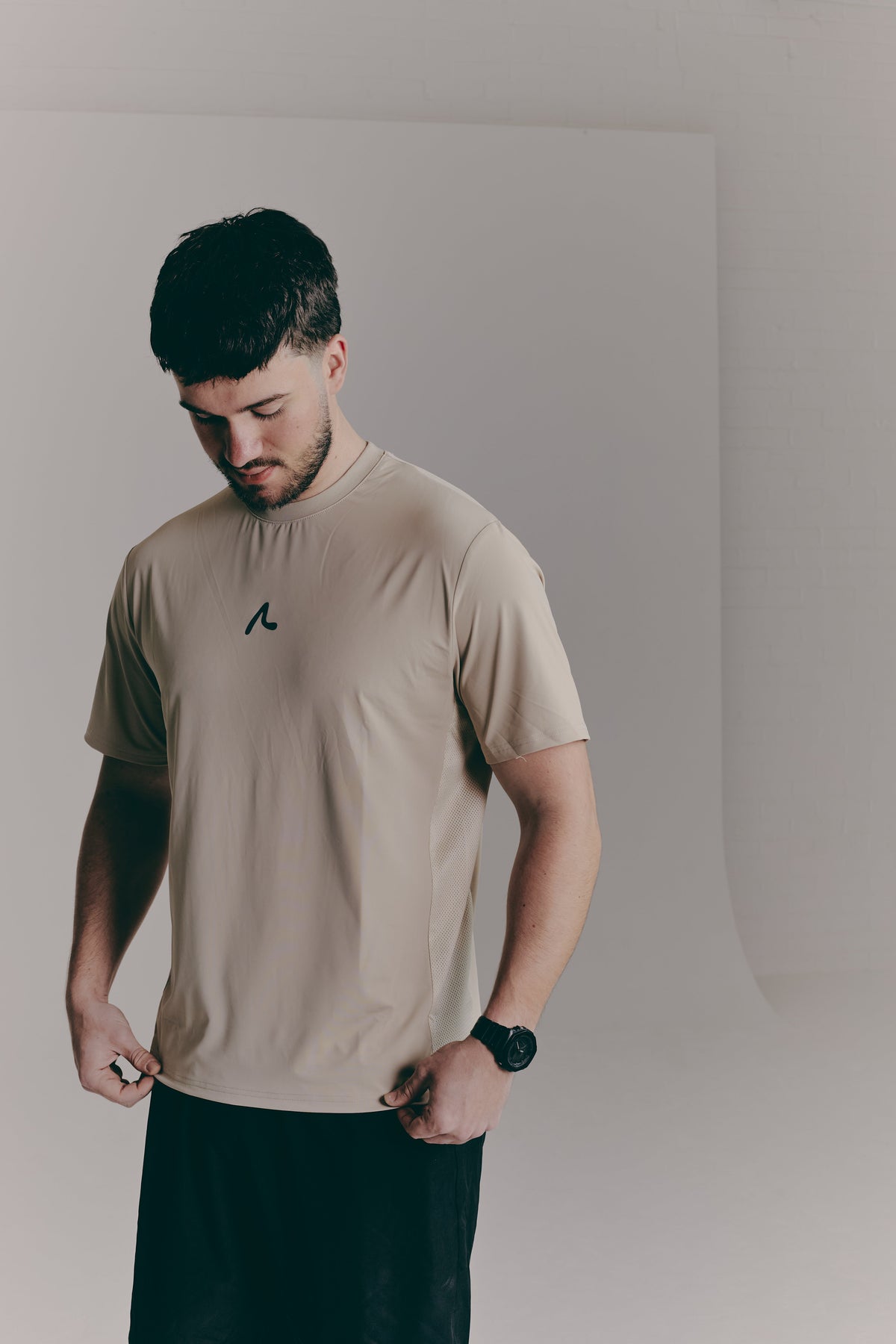 SACA Contest T-Shirt in beige — back view worn by model