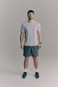 SACA Essential Tee in grey — front view worn by model