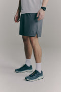 SACA Contest Shorts in grey — front view worn by model