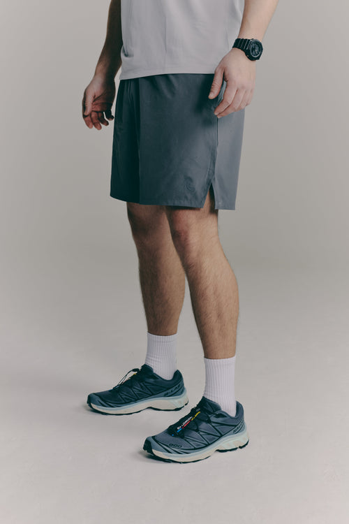 SACA Contest Shorts in grey — front view worn by model